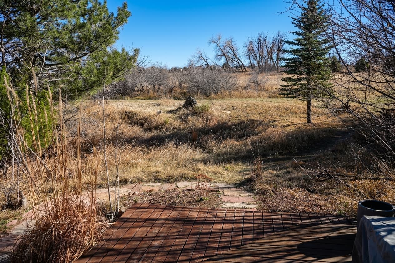 Back deck and gardens at Nyland Cohousing with mountain views